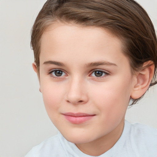 Joyful white child female with short  brown hair and brown eyes