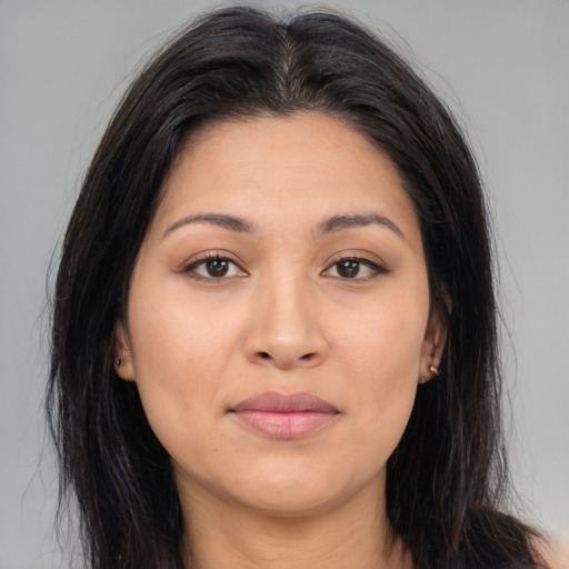 Joyful asian young-adult female with long  brown hair and brown eyes