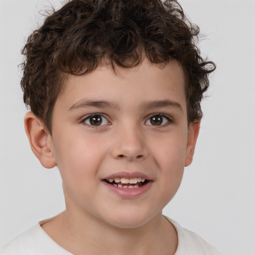 Joyful white child male with short  brown hair and brown eyes