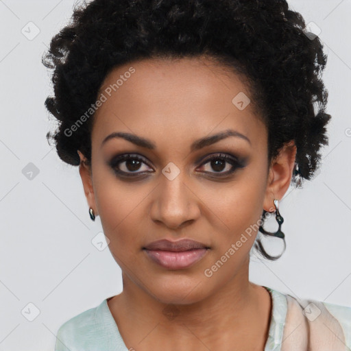 Joyful black young-adult female with short  black hair and brown eyes