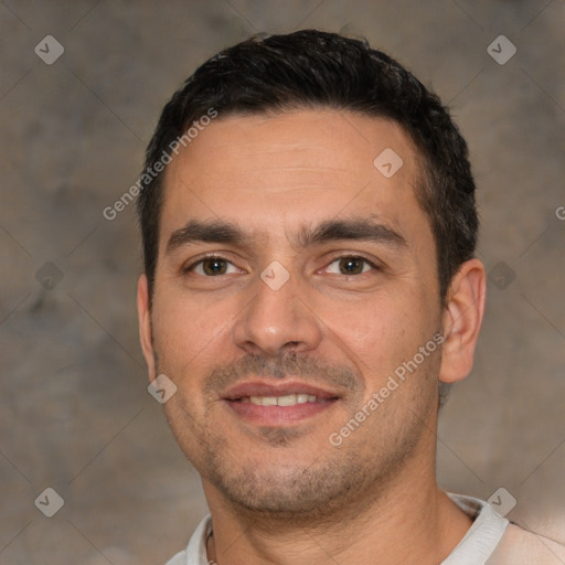 Joyful white young-adult male with short  black hair and brown eyes