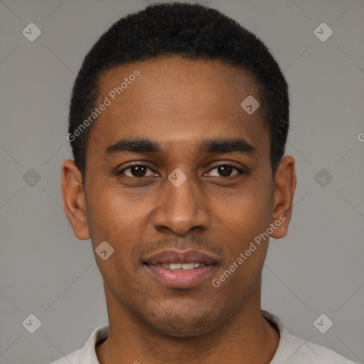 Joyful black young-adult male with short  black hair and brown eyes