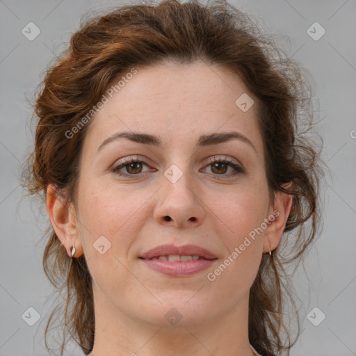 Joyful white young-adult female with medium  brown hair and blue eyes