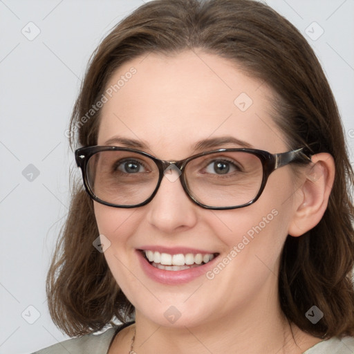 Joyful white young-adult female with medium  brown hair and blue eyes