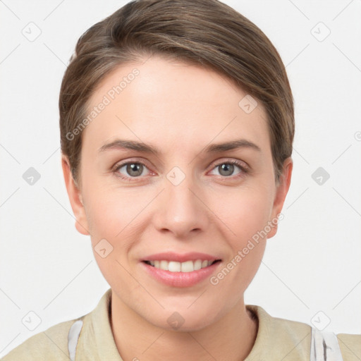 Joyful white young-adult female with medium  brown hair and grey eyes