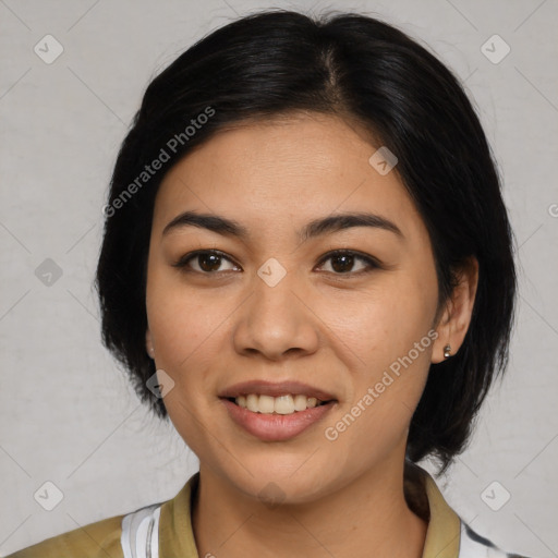 Joyful asian young-adult female with medium  black hair and brown eyes