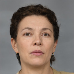 Neutral white adult female with short  brown hair and brown eyes