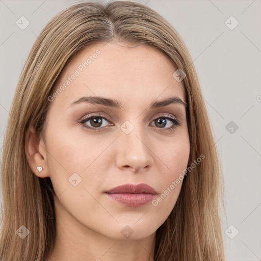 Neutral white young-adult female with long  brown hair and brown eyes