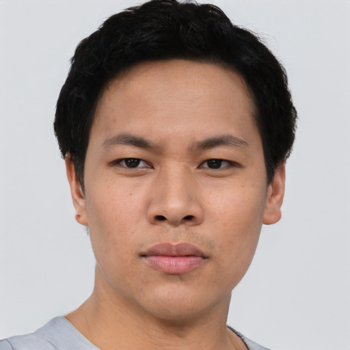 Neutral asian young-adult male with short  black hair and brown eyes