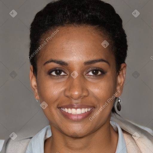 Joyful black young-adult female with short  brown hair and brown eyes