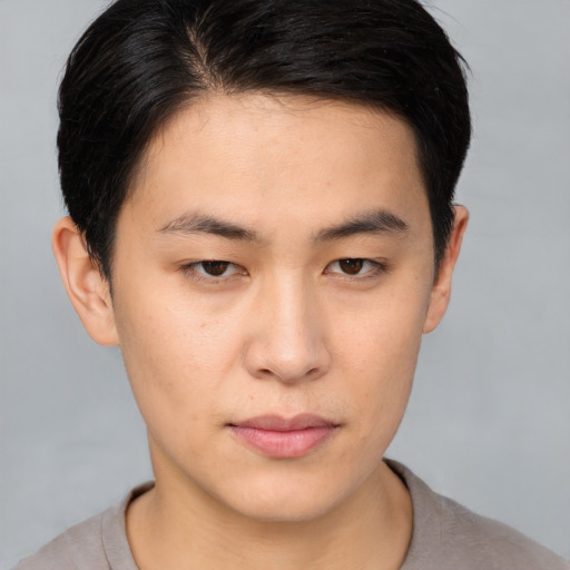 Neutral asian young-adult male with short  brown hair and brown eyes