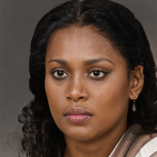 Neutral black young-adult female with long  black hair and brown eyes