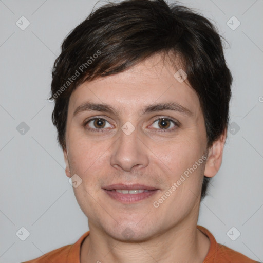 Joyful white adult male with short  brown hair and brown eyes