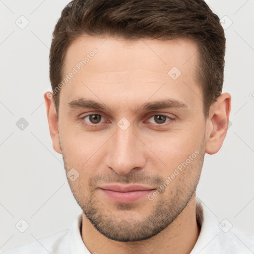 Joyful white young-adult male with short  brown hair and brown eyes