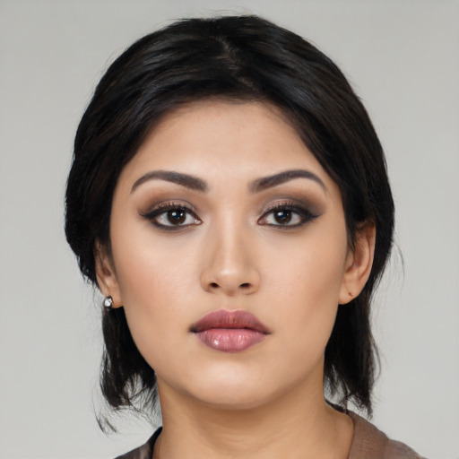 Neutral asian young-adult female with medium  black hair and brown eyes