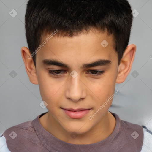 Joyful white child male with short  brown hair and brown eyes