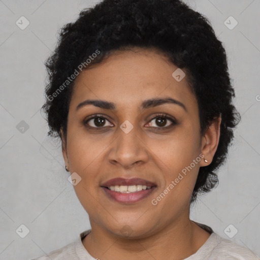 Joyful latino young-adult female with short  black hair and brown eyes