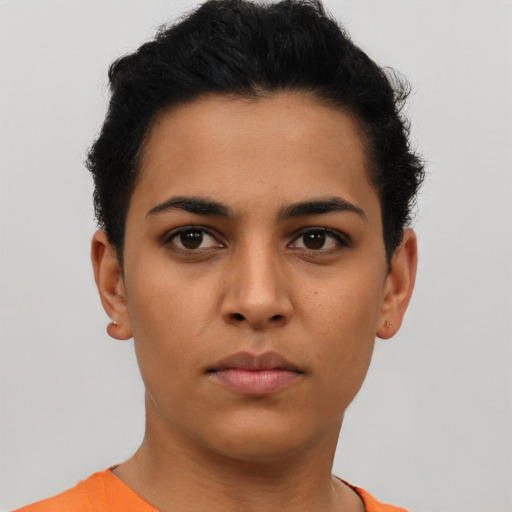 Neutral latino young-adult female with short  brown hair and brown eyes
