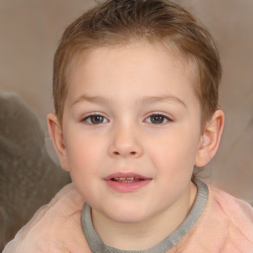 Joyful white child female with short  brown hair and brown eyes