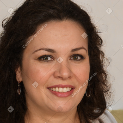 Joyful white adult female with long  brown hair and brown eyes