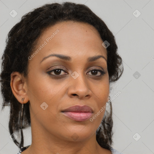 Joyful black young-adult female with medium  brown hair and brown eyes