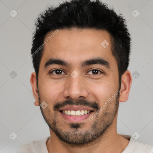 Joyful white young-adult male with short  black hair and brown eyes