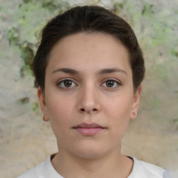 Neutral white young-adult female with short  brown hair and brown eyes