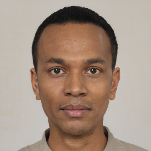 Neutral black young-adult male with short  black hair and brown eyes