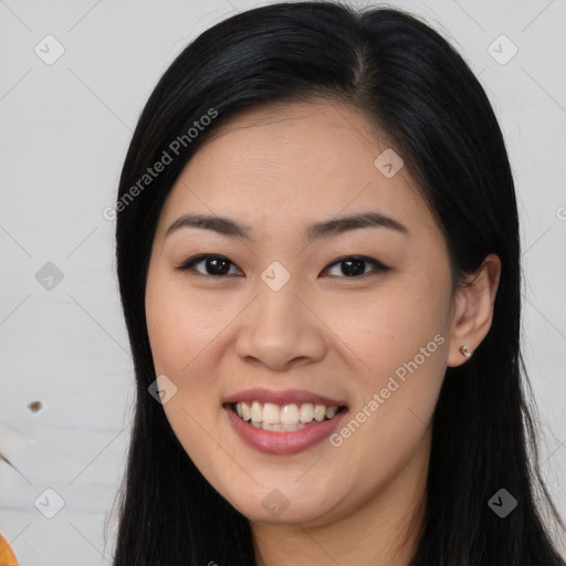 Joyful asian young-adult female with long  brown hair and brown eyes