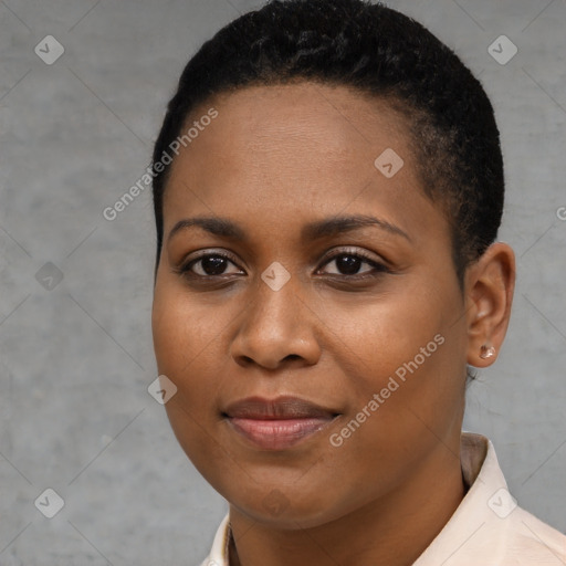 Joyful black young-adult female with short  brown hair and brown eyes