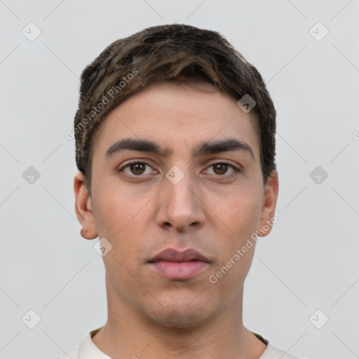 Neutral white young-adult male with short  brown hair and brown eyes