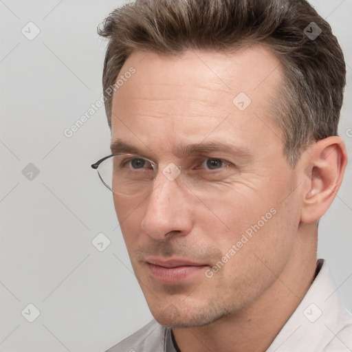 Neutral white adult male with short  brown hair and brown eyes