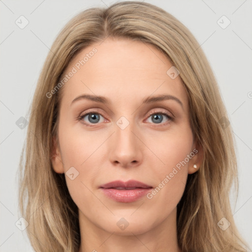 Joyful white young-adult female with long  brown hair and blue eyes