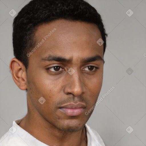 Neutral latino young-adult male with short  brown hair and brown eyes
