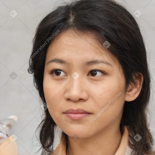 Neutral asian young-adult female with medium  brown hair and brown eyes