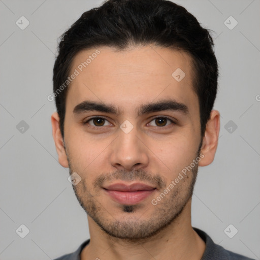 Joyful white young-adult male with short  black hair and brown eyes