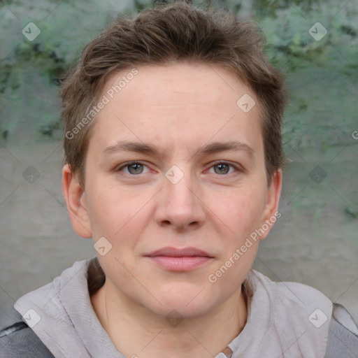 Joyful white young-adult female with short  brown hair and grey eyes