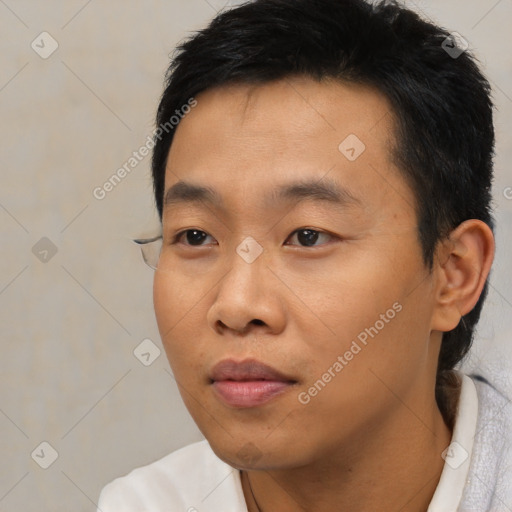 Neutral asian young-adult male with short  black hair and brown eyes