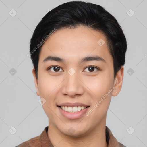 Joyful asian young-adult male with short  black hair and brown eyes