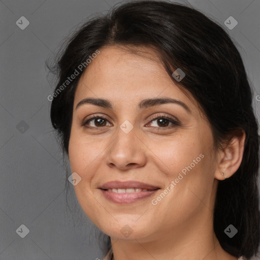 Joyful white adult female with long  brown hair and brown eyes