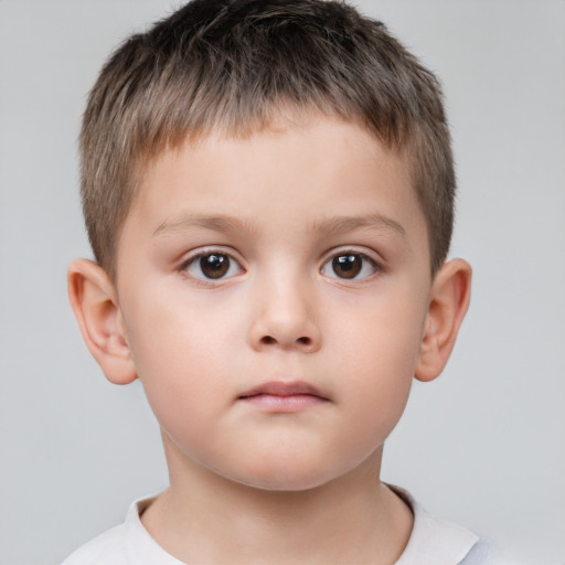 Neutral white child male with short  brown hair and brown eyes