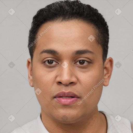 Joyful latino young-adult male with short  black hair and brown eyes