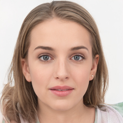 Neutral white young-adult female with medium  brown hair and grey eyes