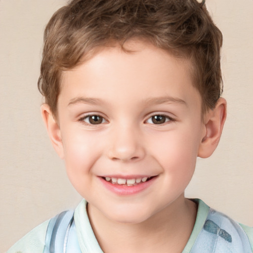 Joyful white child male with short  brown hair and brown eyes