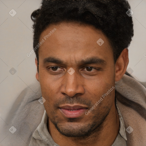 Neutral latino adult male with short  black hair and brown eyes