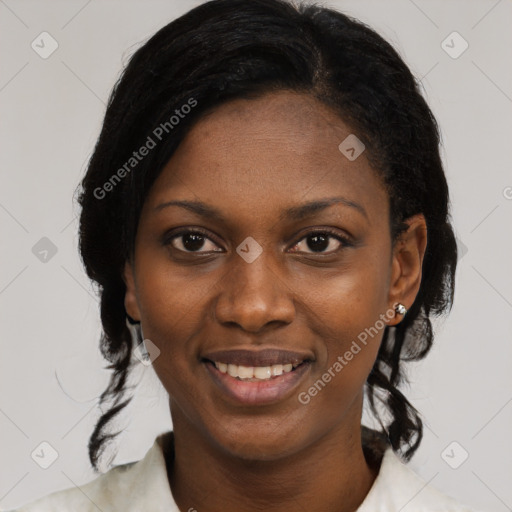 Joyful black young-adult female with medium  black hair and brown eyes