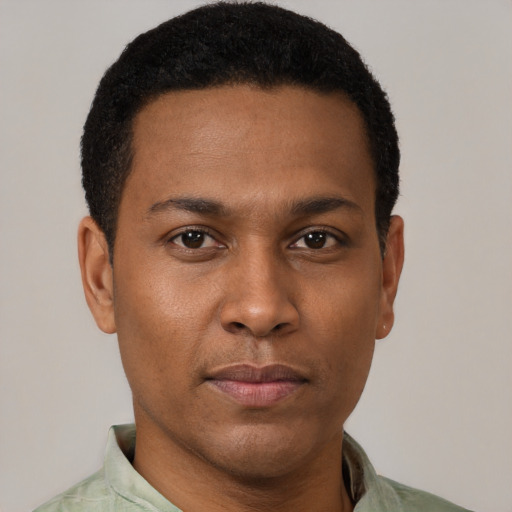 Neutral black young-adult male with short  brown hair and brown eyes