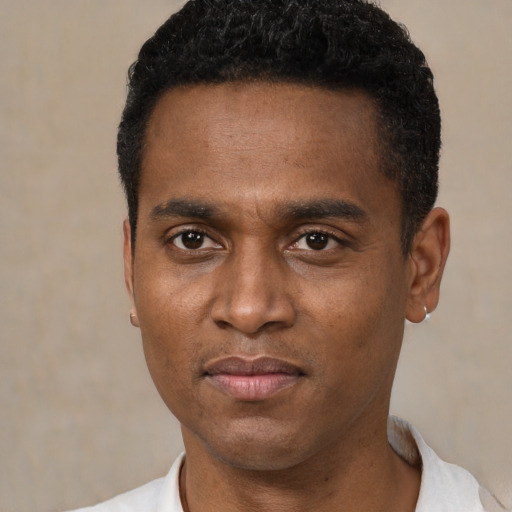 Neutral black young-adult male with short  black hair and brown eyes