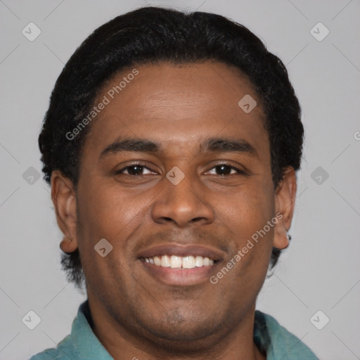 Joyful latino young-adult male with short  black hair and brown eyes