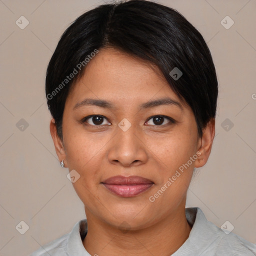 Joyful asian young-adult female with short  black hair and brown eyes